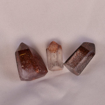 Vibrant Lepidocrocite crystal, shimmering with layers of red and gold, symbolizing deep spiritual cleansing and enlightenment.