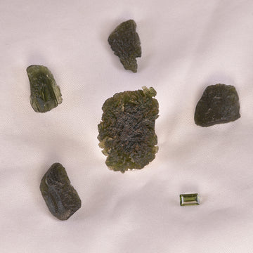 Vivid green Moldavite crystal, radiating intense energy and ethereal beauty, symbolizing cosmic connection and spiritual transformation.