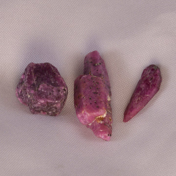 Deep red Ruby gemstone, symbolizing vitality and passion.