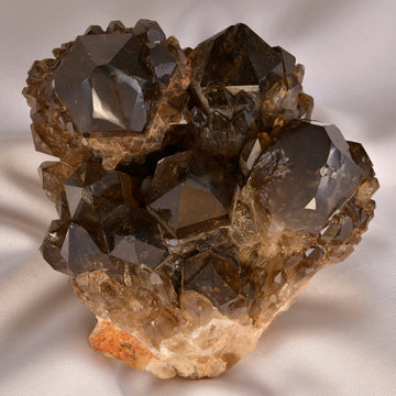Smoky Quartz crystal displaying its calming and grounding hues.