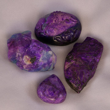 Sugilite gemstone, known for its deep metaphysical properties and vibrant hues.