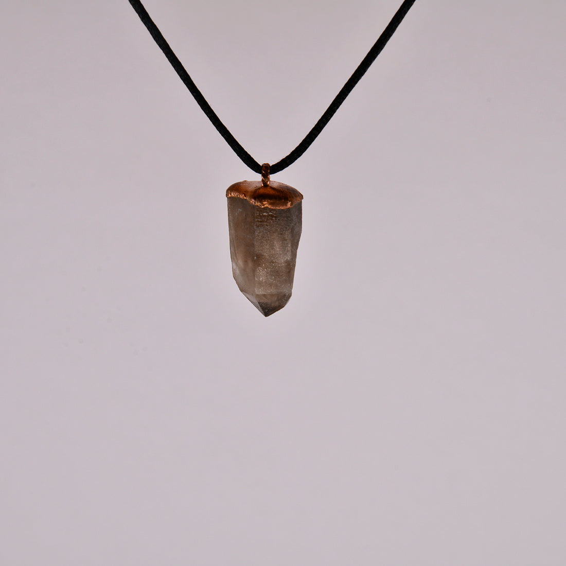 Smoky Quartz Crystal Pendant: A Protective Amulet for Grounding and Clarity