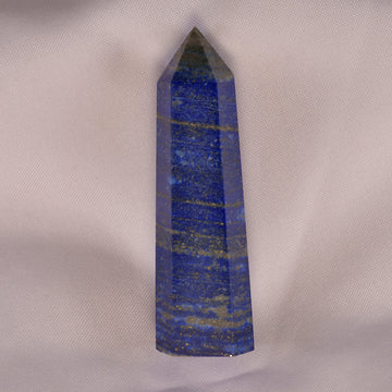 Rich, deep blue Lapis Lazuli stone, flecked with golden pyrite, symbolizing wisdom, truth, and spiritual enlightenment.