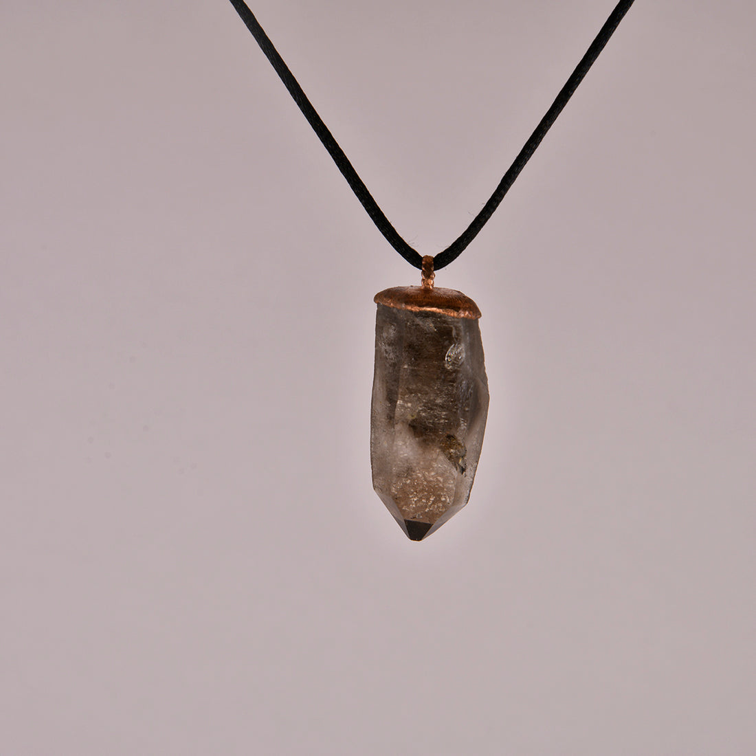 Smoky Quartz Crystal Pendant: A Protective Amulet for Grounding and Clarity