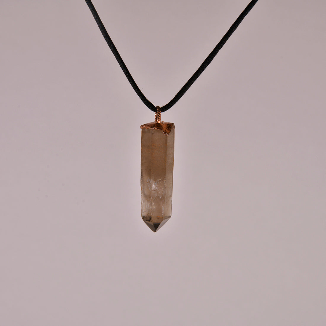 Smoky Quartz Crystal Pendant: A Protective Amulet for Grounding and Clarity