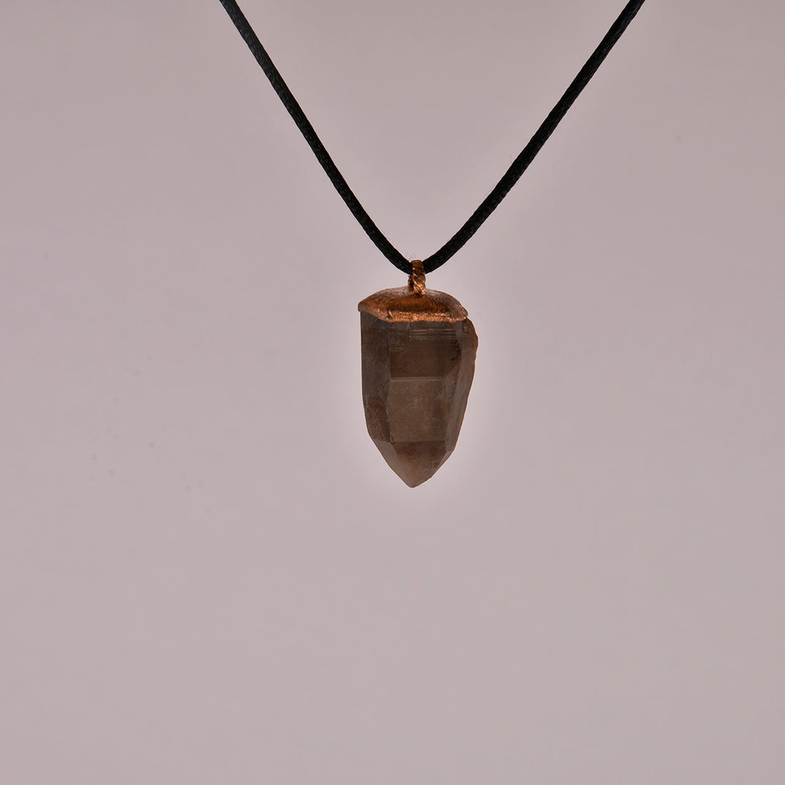 Smoky Quartz Crystal Pendant: A Protective Amulet for Grounding and Clarity