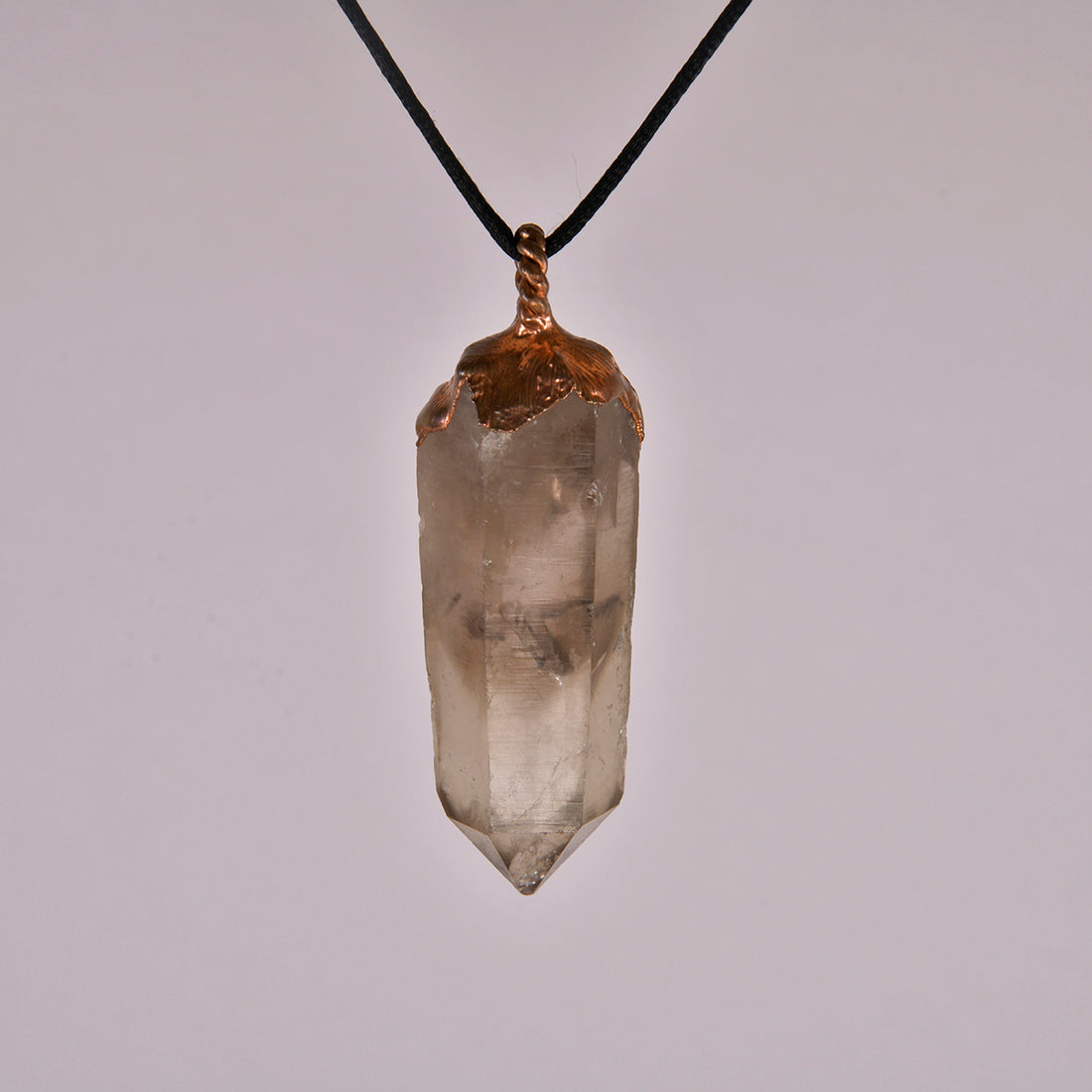 Smoky Phantom Quartz Crystal Pendant: A Mystical Blend of Grounding and Insight