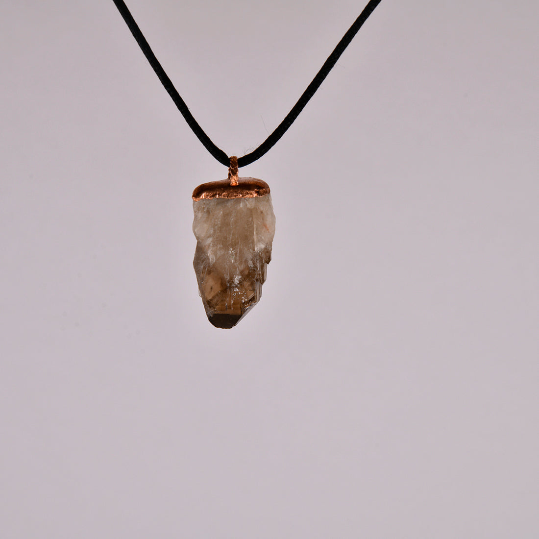 Smoky Quartz Crystal Pendant: A Protective Amulet for Grounding and Clarity