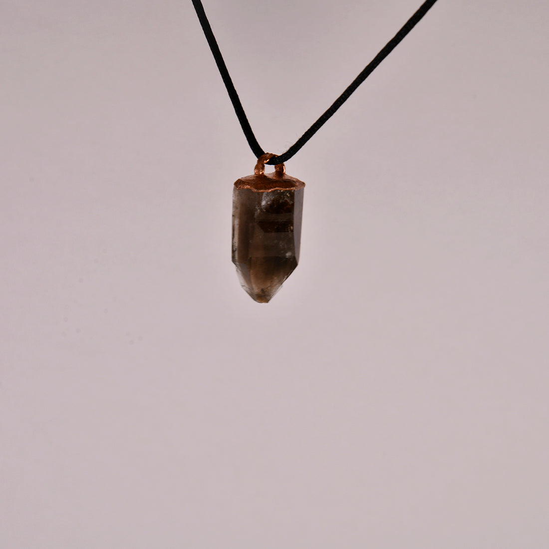 "Handcrafted copper electroformed pendant featuring Smoky Quartz and Aegirine crystals from Star Das Creations. Unique esoteric jewellery combining grounding Smoky Quartz and protective Aegirine. Perfect for crystal healing and spiritual enhancement."