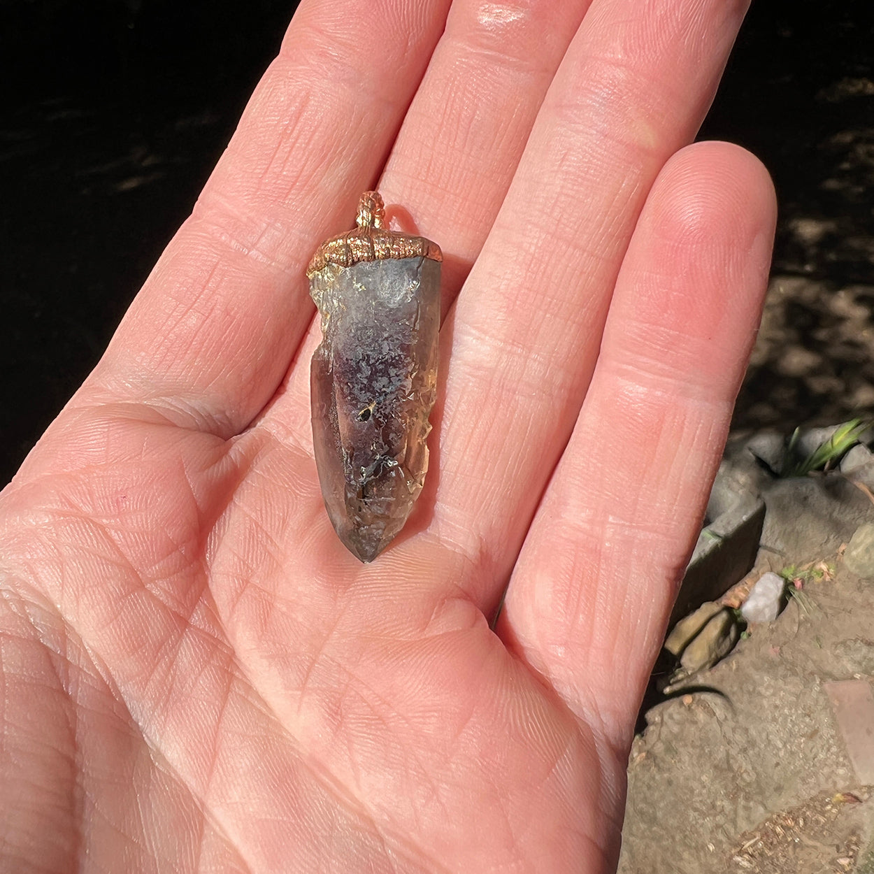 "Handcrafted copper electroformed pendant featuring a Skeletal Smoky Quartz crystal, known for its esoteric healing properties. Unique, one-of-a-kind jewellery piece for spiritual enthusiasts."