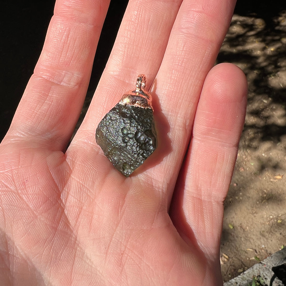 "Handcrafted copper electroformed Moldavite pendant by Star Das Creations, featuring a unique esoteric design with natural Moldavite crystal."