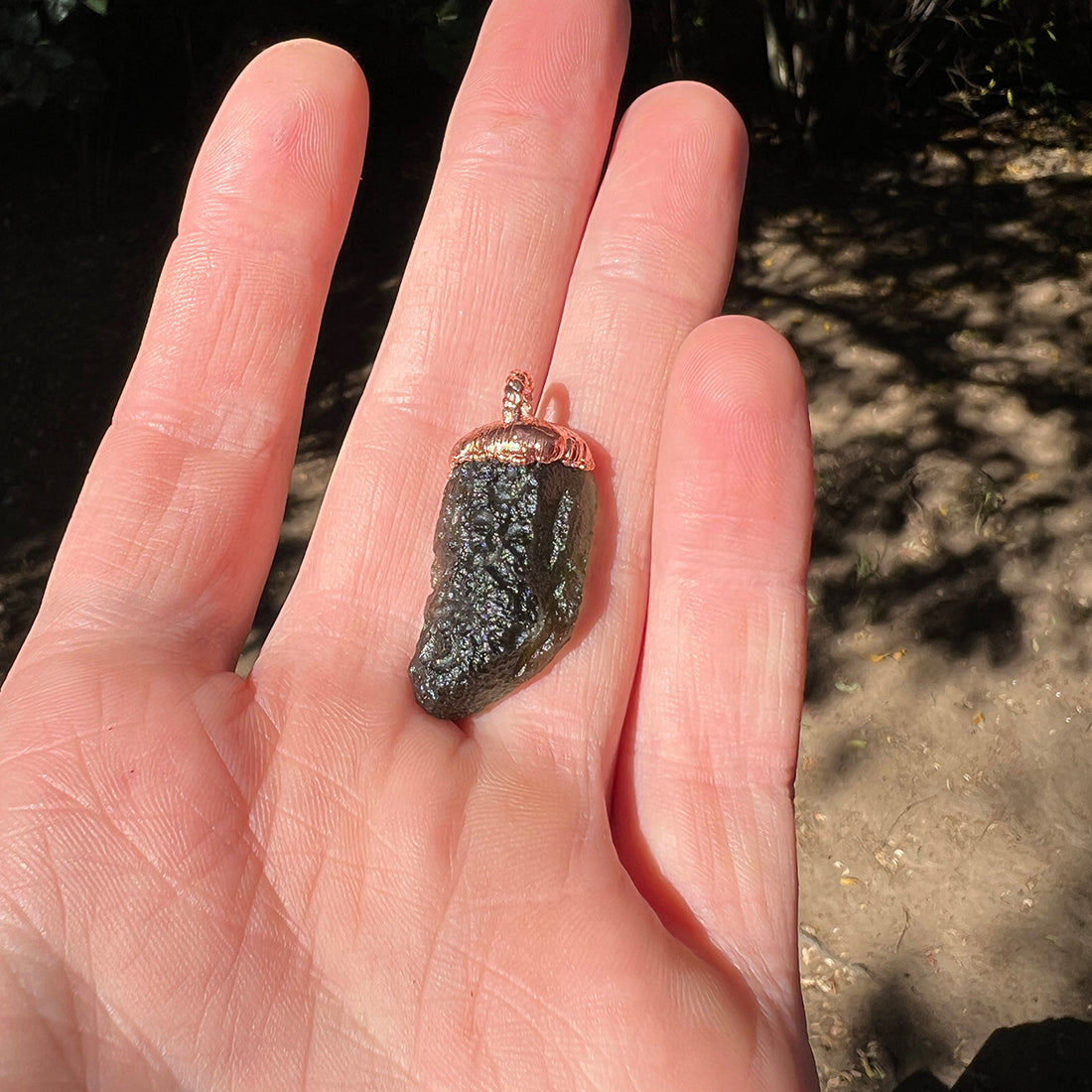 "Handcrafted copper electroformed Moldavite pendant by Star Das Creations, featuring a unique esoteric design with natural Moldavite crystal."