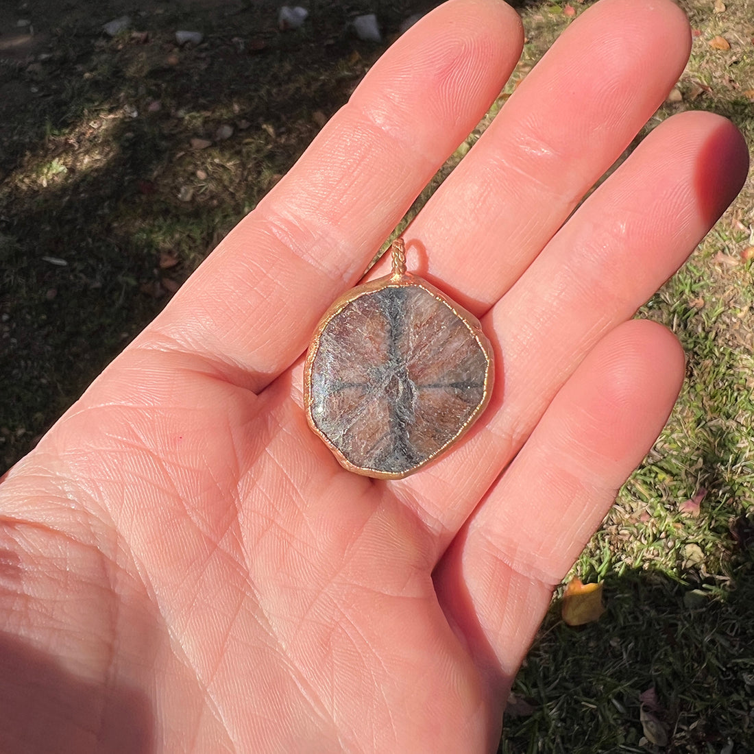 "Handcrafted copper electroformed pendant featuring an esoteric andalusite crystal, designed for spiritual healing and metaphysical energy alignment."