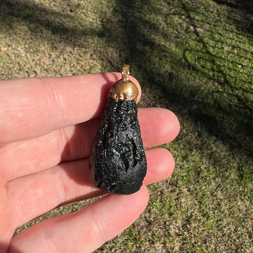 Black Tektite Crystal Pendant, Handcrafted Black Tektite Pendant for spiritual growth, Cosmic energy Black Tektite Crystal Necklace, Protective Black Tektite Pendant with grounding properties