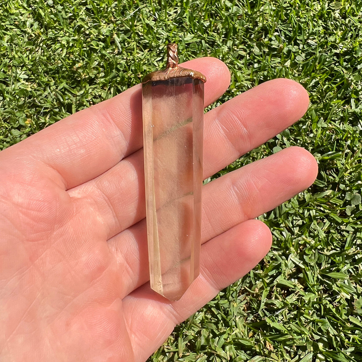 Clear Quartz + Limonite inclusions