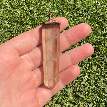 Clear Quartz + Limonite inclusions