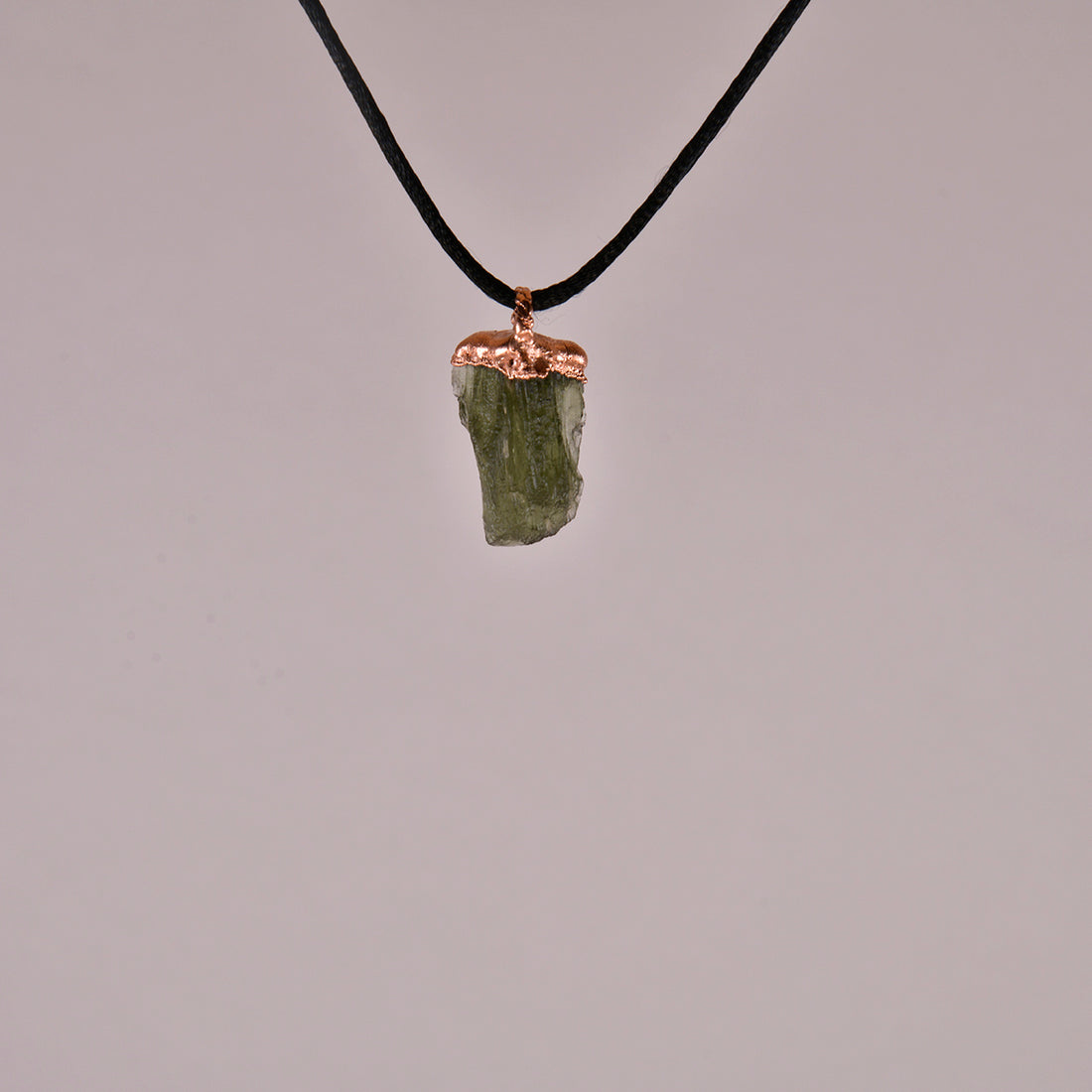 "Handcrafted copper electroformed Moldavite pendant by Star Das Creations, featuring a unique esoteric design with natural Moldavite crystal."